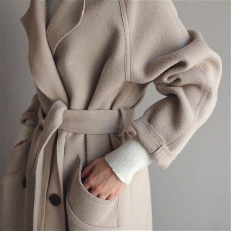 Dames mantel lang – Elegante warme winterjas met strik en hoge kraag
