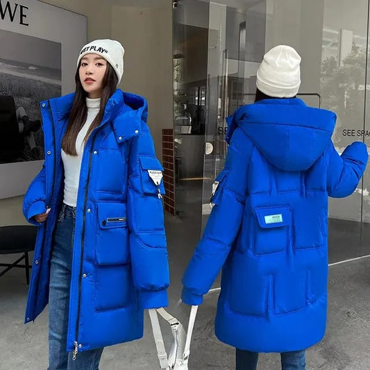 Gewatteerde jas dames – Lange winterjas met capuchon en trendy design
